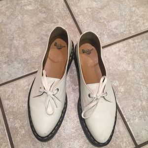 Dr. Martens in white with lace up top.
